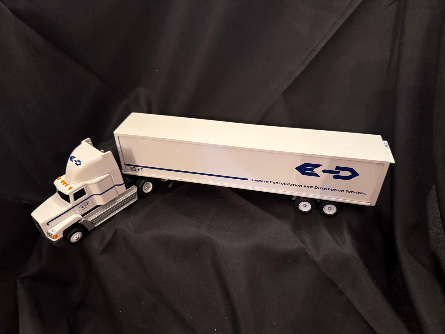 White Metal Eastern Consolidation and Distribution Services Tractor Trailer