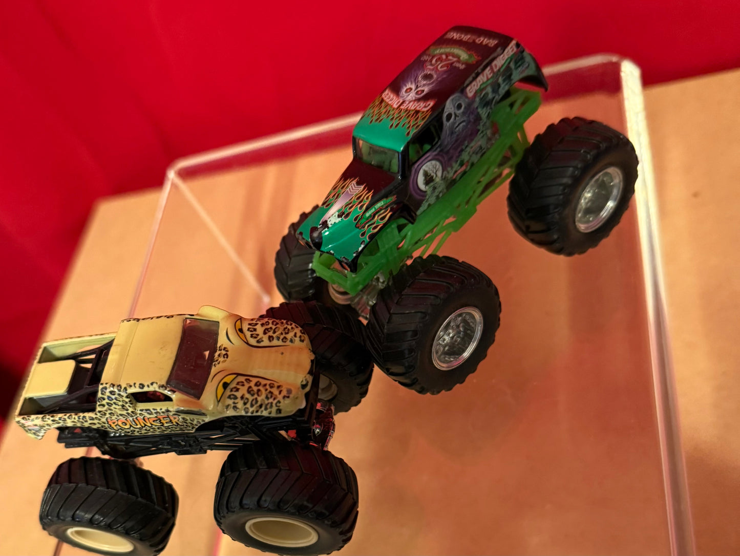 GRAVE DIGGER AND POUNCER HOT WHEELS 4 X 4 TRUCKS