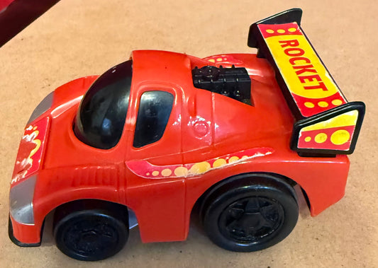 RED ROCKET TOY CAR