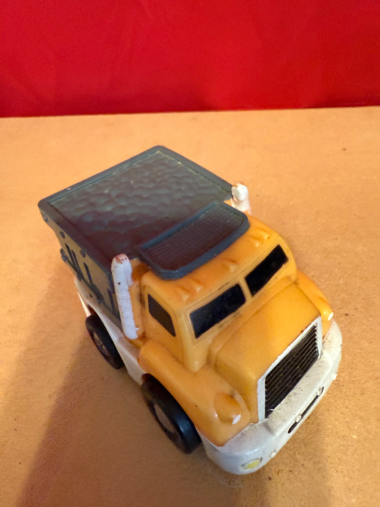 KID GALAXY YELLOW PULL BACK DUMP TRUCK