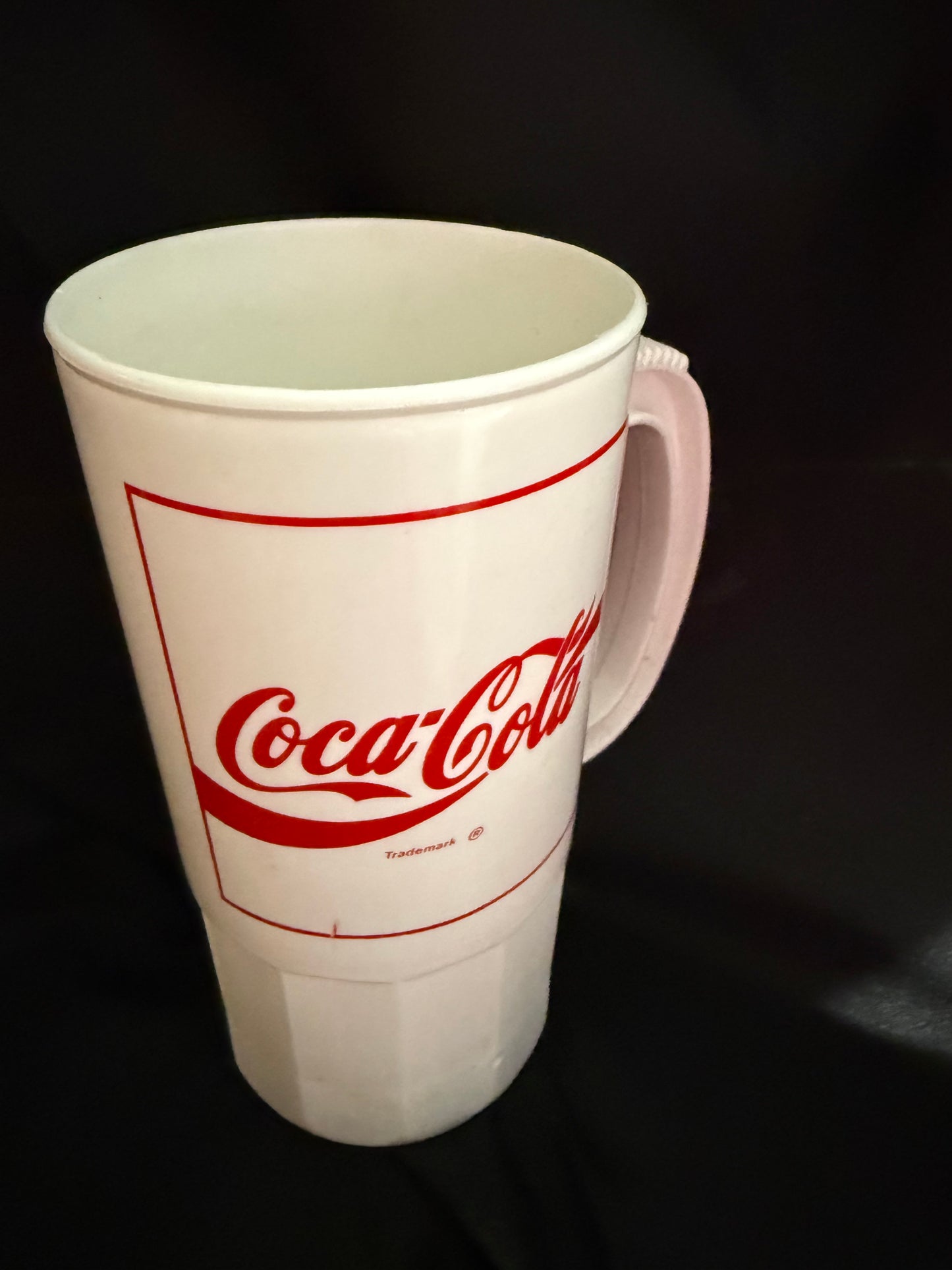 COCA COLA WHITE PLASTIC CUP WITH HANDLE AND RED LETTERING