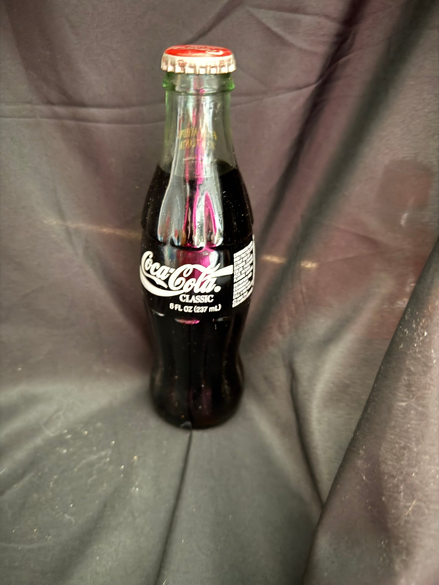 COCA COLA BOTTLE - BALTIMORE RAVENS - 10 YEARS OF RAVENS FOOTBALL - FULL 8 OZ.