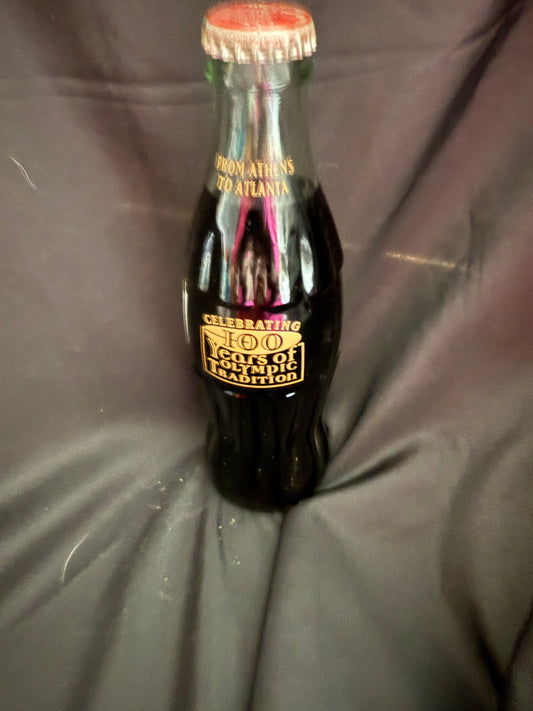 COCA COLA BOTTLE - BALTIMORE RAVENS - 10 YEARS OF RAVENS FOOTBALL - FULL 8 OZ.